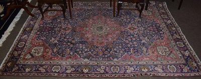 Lot 1138 - Tabriz carpet, the indigo field of vines around a raspberry medallion framed by spandrels and...