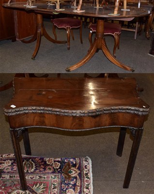Lot 1182 - An early 20th century mahogany twin pedestal dining table with one additional leaf, 208cm fully...