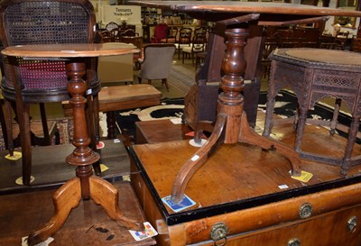 Lot 1186 - A George III oak tilt top tripod table; together with a Victorian mahogany tripod table (2)