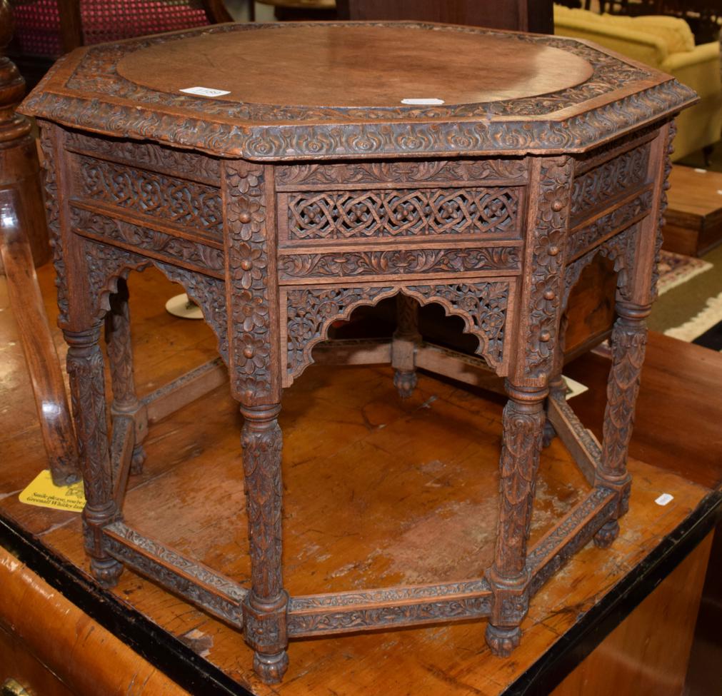 Lot 1189 - A carved oak octagonal occasional table in the Middle Eastern taste