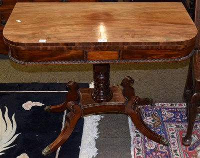 Lot 1195 - A Regency mahogany fold over card table