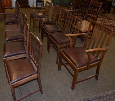 Lot 1214 - A harlequin set of eleven George III style dining chairs, including two carvers