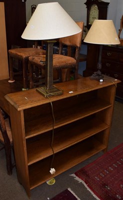 Lot 1231 - Two decorative table lamps; and a small oak open bookcase (3)