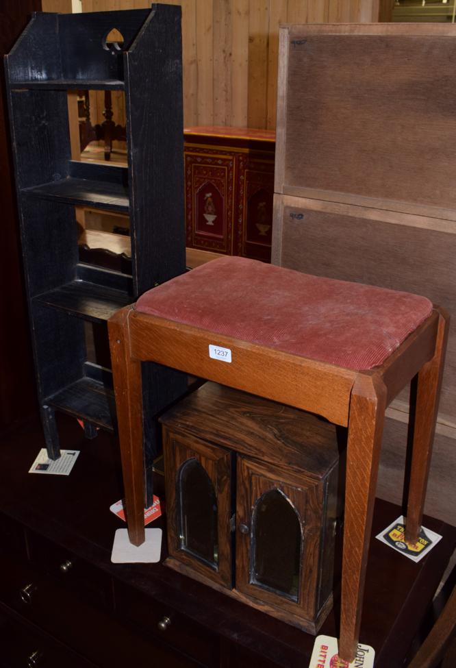 Lot 1237 - A small open bookcase; a jewellery box; an oak stool; and a toilet mirror