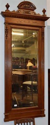 Lot 1243 - A mahogany architectural form hall mirror