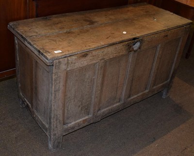 Lot 1254 - An 18th century oak four panel coffer