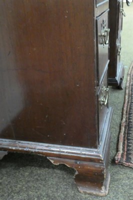 Lot 1258 - An 18th century mahogany kneehole desk