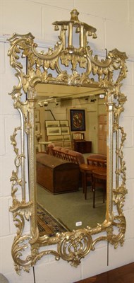 Lot 1262 - A reproduction Chippendale style mirror