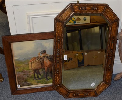 Lot 1263 - A 1920s/30s oak mirror; and a colour print