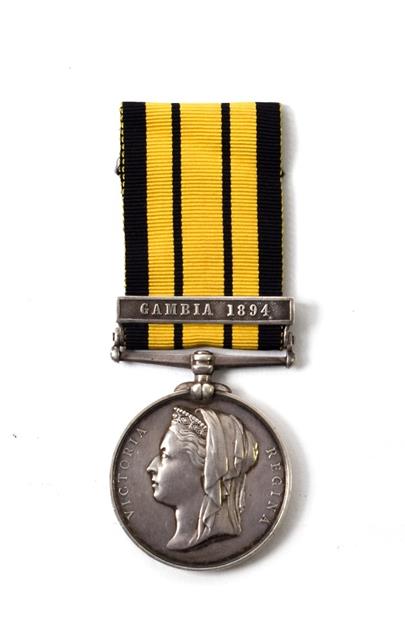 Lot 2017 - An East and West Africa Medal, with clasp GAMBIA 1894, awarded to F(Francis) J(Joseph) WHITE, ORD.