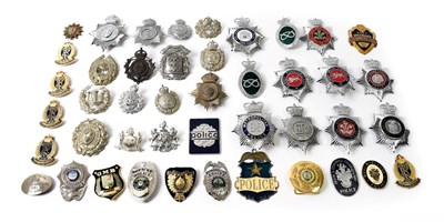 Lot 2077 - Nine Pre-1953 Police Helmet Plates, of various sizes, in chrome and white metal, including...