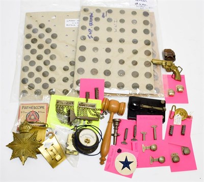 Lot 2094 - Militaria, including belt clasps, a Morse code tapper with wood base in original box, a Morse...
