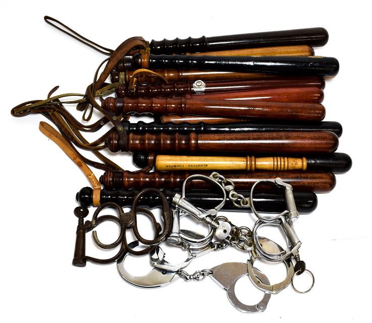 Lot 2128 - A Collection of Fifteen Various Modern Police Truncheons, in ebonised wood, mahogany, beech and...