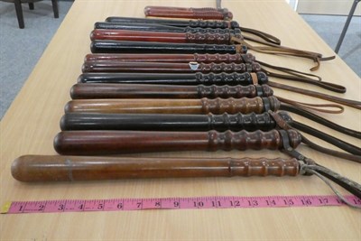 Lot 2128 - A Collection of Fifteen Various Modern Police Truncheons, in ebonised wood, mahogany, beech and...