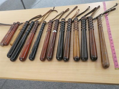 Lot 2128 - A Collection of Fifteen Various Modern Police Truncheons, in ebonised wood, mahogany, beech and...
