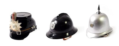 Lot 2141 - A German Police Shako, with black patent finish, white metal helmet plate for Berlin surmounted...