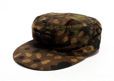 Lot 2166 - A Copy of a German Third Reich SS Camouflage Field Cap, of herringbone twill, the exterior with...