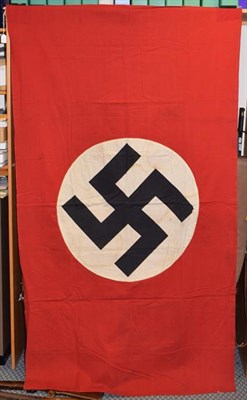 Lot 2168 - A German Third Reich NSDAP Flag, in red cotton, each side applied with white cotton roundel printed