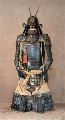 Lot 2186 - A Japanese Edo Suit of Armour, 1603-1868,  comprising a five plate brown lacquered iron Zunari...