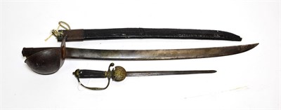 Lot 2209 - A French Model 1833 Naval Cutlass, the 68cm single edge broad fullered steel blade engraved with an