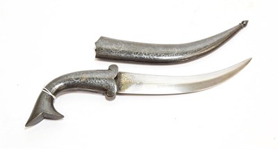 Lot 2278 - An Indian Khanjar Dagger, the 18cm double edge curved steel blade inlaid with silver arabesques...