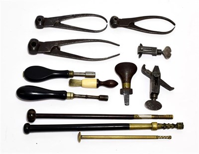 Lot 2292 - A Collection of 19th Century Gun Accessories, comprising a turnscrew with walnut handle, an...