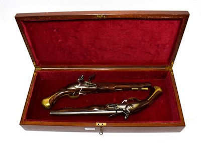 Lot 2343 - A Good Pair of Non-working Copies of Flintlock Pistols, each with a 30cm round steel barrel, walnut