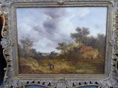 Lot 1059 - Follower of John Crome (1768-1821)  Figures on a country path in a rural landscape Oil on...