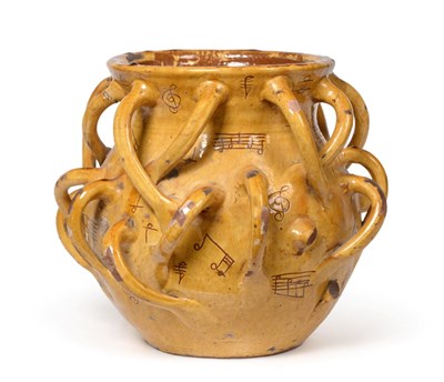 Lot 3 - A Ewenny Slipware ''Musical Notation'' Wassail Bowl, 19th century, of baluster form with flared...