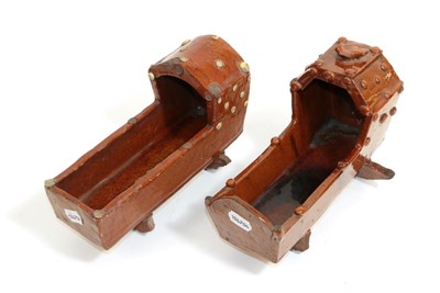 Lot 5 - A Treacle Glazed Pottery Cradle, probably Yorkshire, 19th century, of traditional form on two...