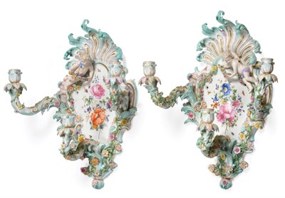Lot 10 - A Pair of Meissen Porcelain Three-Branch Wall Sconces, circa 1900, of flower moulded and...