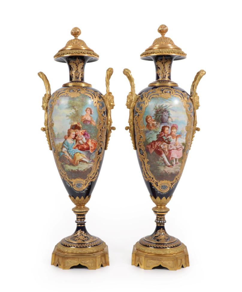 Lot 16 - A Pair of Gilt Metal Mounted Sèvres Style Porcelain Vases and Covers, circa 1900, of baluster form