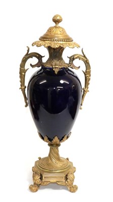 Lot 18 - A Gilt Metal Mounted Sèvres Style Porcelain Vase, late 19th century, of blue glazed ovoid form...