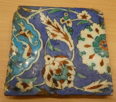 Lot 29 - An Isnik Pottery Tile, circa 1580, typically painted in red, green, turquoise and blue with...