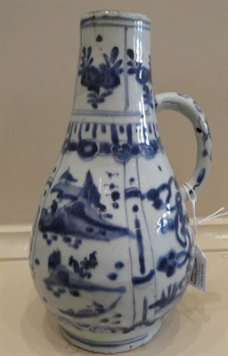 Lot 36 - A Kraak Porcelain Ewer, early 17th century, of pear shape with loop handle, typically painted...