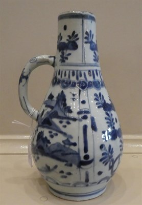 Lot 36 - A Kraak Porcelain Ewer, early 17th century, of pear shape with loop handle, typically painted...