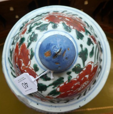 Lot 40 - A Chinese Wucai Porcelain Baluster Jar and Cover, 17th century, painted with mythical beasts...