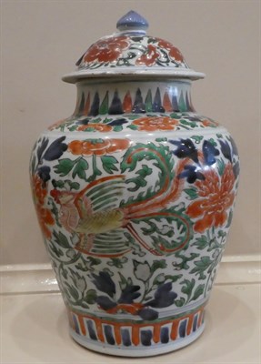 Lot 40 - A Chinese Wucai Porcelain Baluster Jar and Cover, 17th century, painted with mythical beasts...