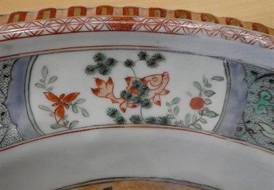 Lot 46 - A Chinese Porcelain Charger, Kangxi, painted in famille verte enamels with a phoenix amongst...
