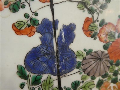 Lot 48 - A Chinese Porcelain Dish, Kangxi, painted in famille verte enamels with a basket of flowers...