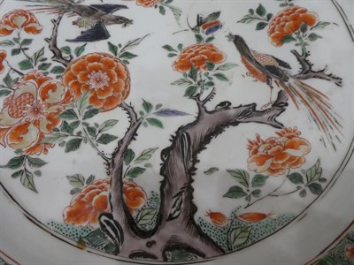 Lot 51 - A Chinese Porcelain Charger, Kangxi, painted in famille verte enamels with a birds amongst...