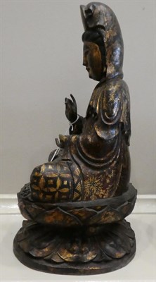 Lot 70 - A Chinese Gilt and Lacquered Wood Figure of Buddha, probably 16th century, carved seated in...