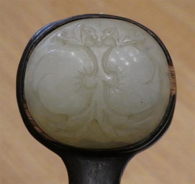 Lot 72 - A Chinese Jade Mounted Hardwood Ruyi Sceptre, Qing dynasty, 19th century, of typical form, the jade