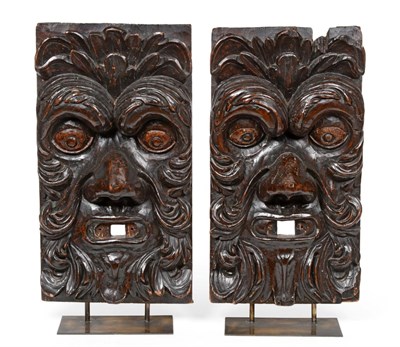 Lot 220 - A Pair of Venetian Carved Pine Wall Masks, 18th century, each worked in high relief as a Green Man