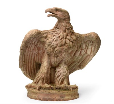 Lot 223 - A Terracotta Model of a Florentine Eagle, perched, wings partially outstretched, on an oval plinth