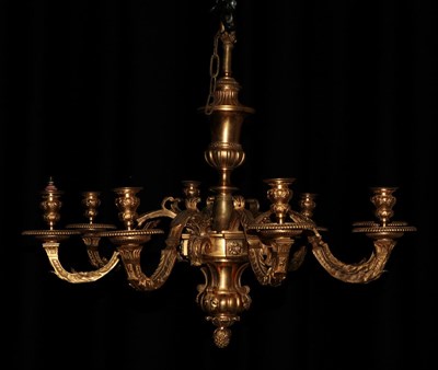 Lot 235 - A Gilt Metal Eight-Light Chandelier, in Louis XIV style, with baluster column and leaf sheathed...