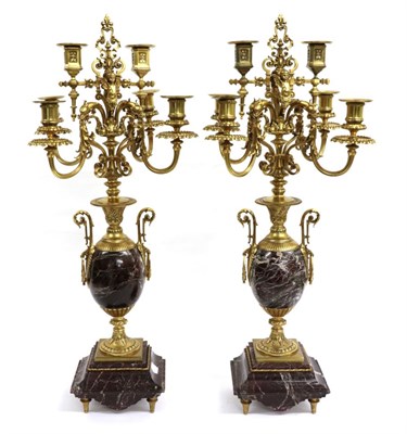 Lot 236 - A Pair of French Gilt Metal Mounted Marble Six-Light Candelabra, in Renaissance style, with...