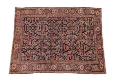 Lot 240 - Bakshaish Carpet North West Iran, circa 1900 The midnight blue Herati field enclosed by madder...