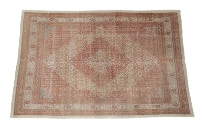 Lot 243 - Tabriz Haji Jalili Carpet North West Iran, circa 1880 The soft terracotta field of Herati...