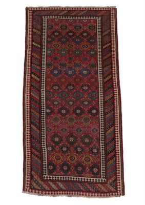 Lot 253 - Bidjar Rug Iranian Kurdistan, circa 1910 The brick red field of flower heads enclosed by polychrome